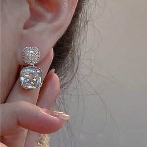 Silver Earrings with Dazzling Diamond-like Stones and Elegant Design